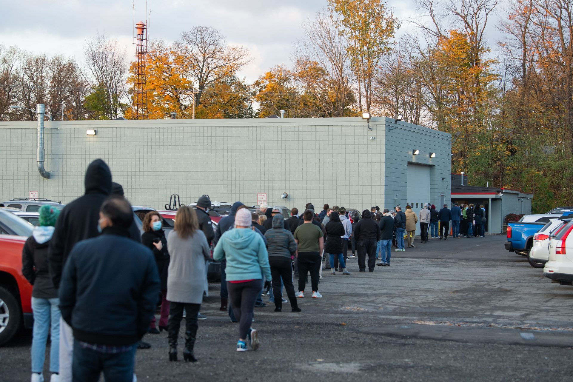 Voters stand in line at Belle Valley Fire Department in Erie County waiting to vote in-person on Nov. 3. A post-election report from Erie County’s clerk said there were “significant instances where judges of elections lacked understanding about the basic operation of the polling place.”