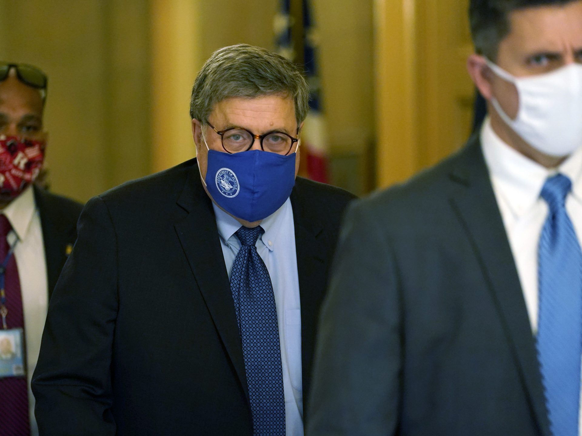 Attorney General William Barr leaves the office of Senate Majority Leader Mitch McConnell of Ky., on Capitol Hill in Washington, Monday, Nov. 9, 2020.
