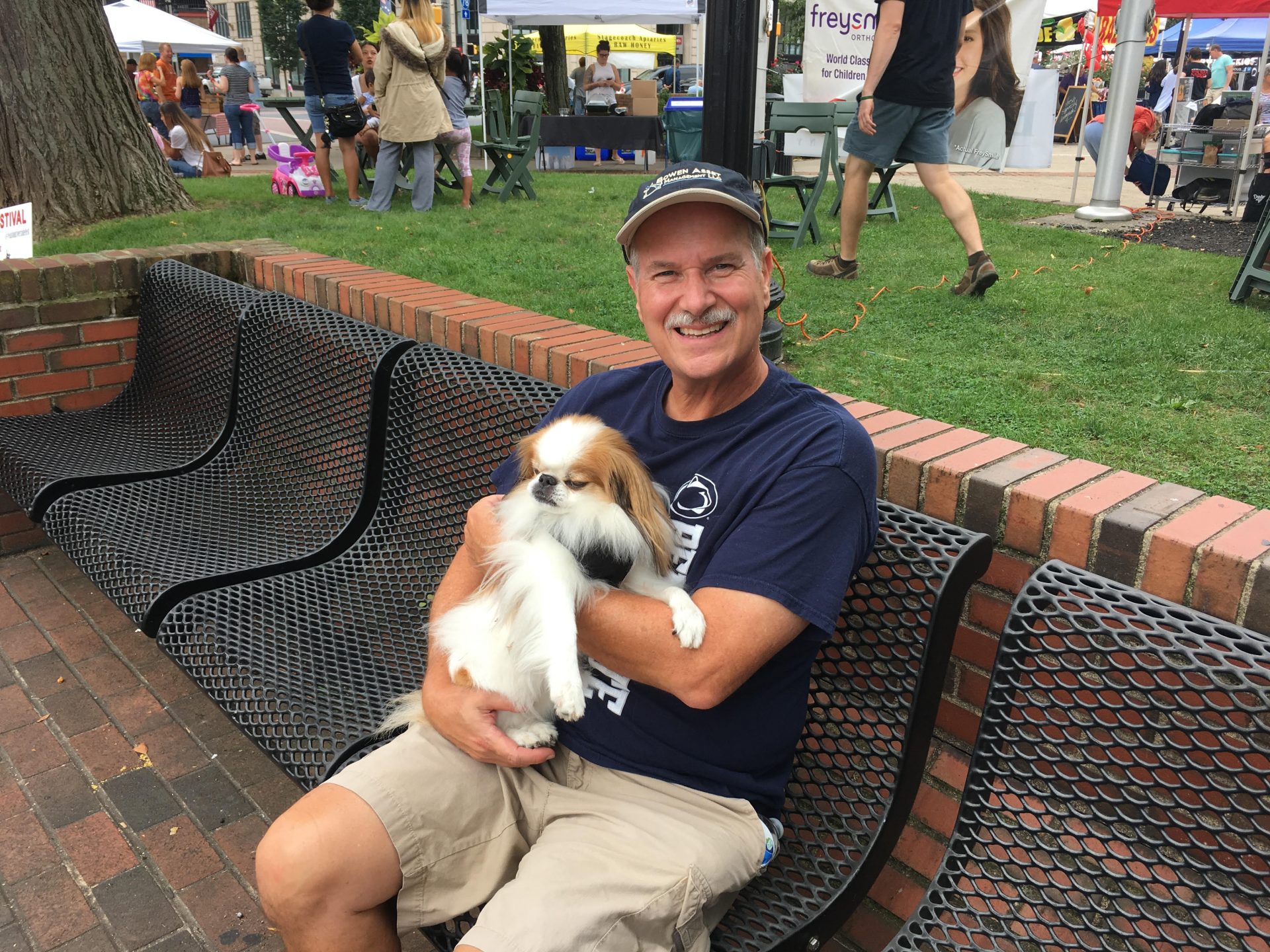 Republican Tom Krause sits with his dog in Easton on Sept. 15, 2018.