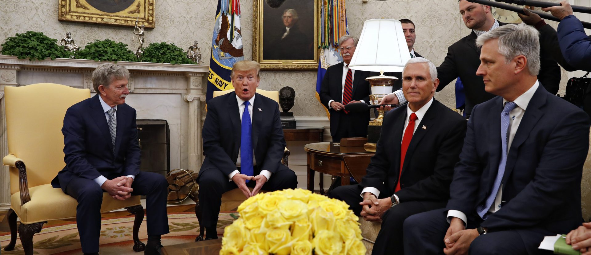 In this March 6, 2019, file photo, former U.S. hostage in Yemen, Danny Burch, left, listens as President Donald Trump speaks, Wednesday, March 6, 2019, in the Oval Office of the White House in Washington, next to Vice President Mike Pence, and Special Presidential Envoy for Hostage Affairs Robert O'Brien.
