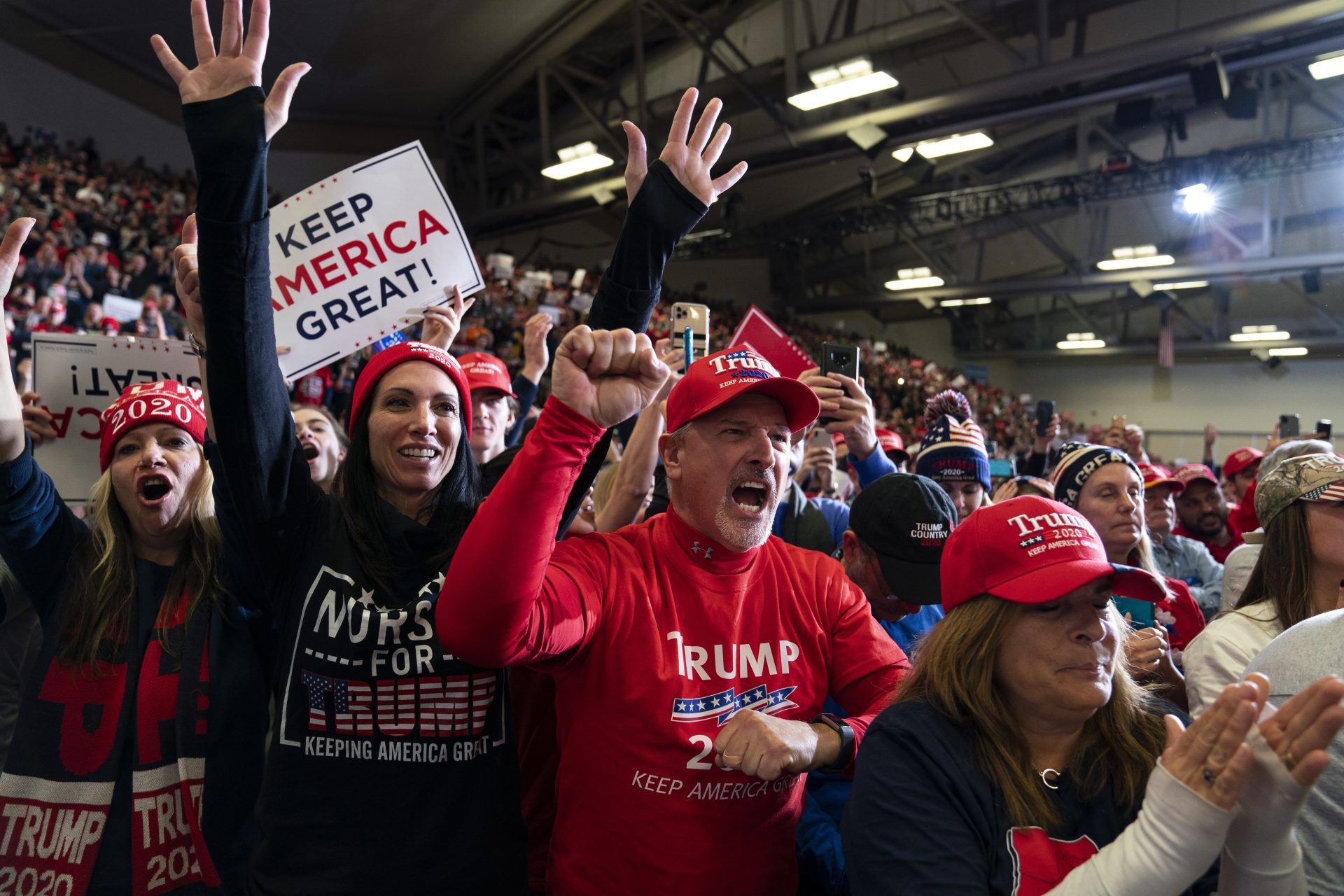 Supporters of President Donald Trump cheer as he speaks at a campaign rally at the Wildwoods Convention Center Oceanfront, Tuesday, Jan. 28, 2020, in Wildwood, N.J.