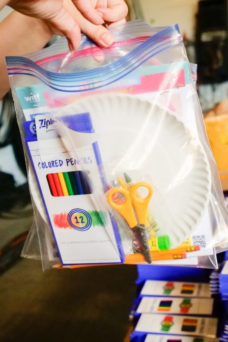 Each of the 3,000 bags included craft supplies such as safety scissors, colored pencils, crayons, pencils, a pencil sharpener and a glue stick.