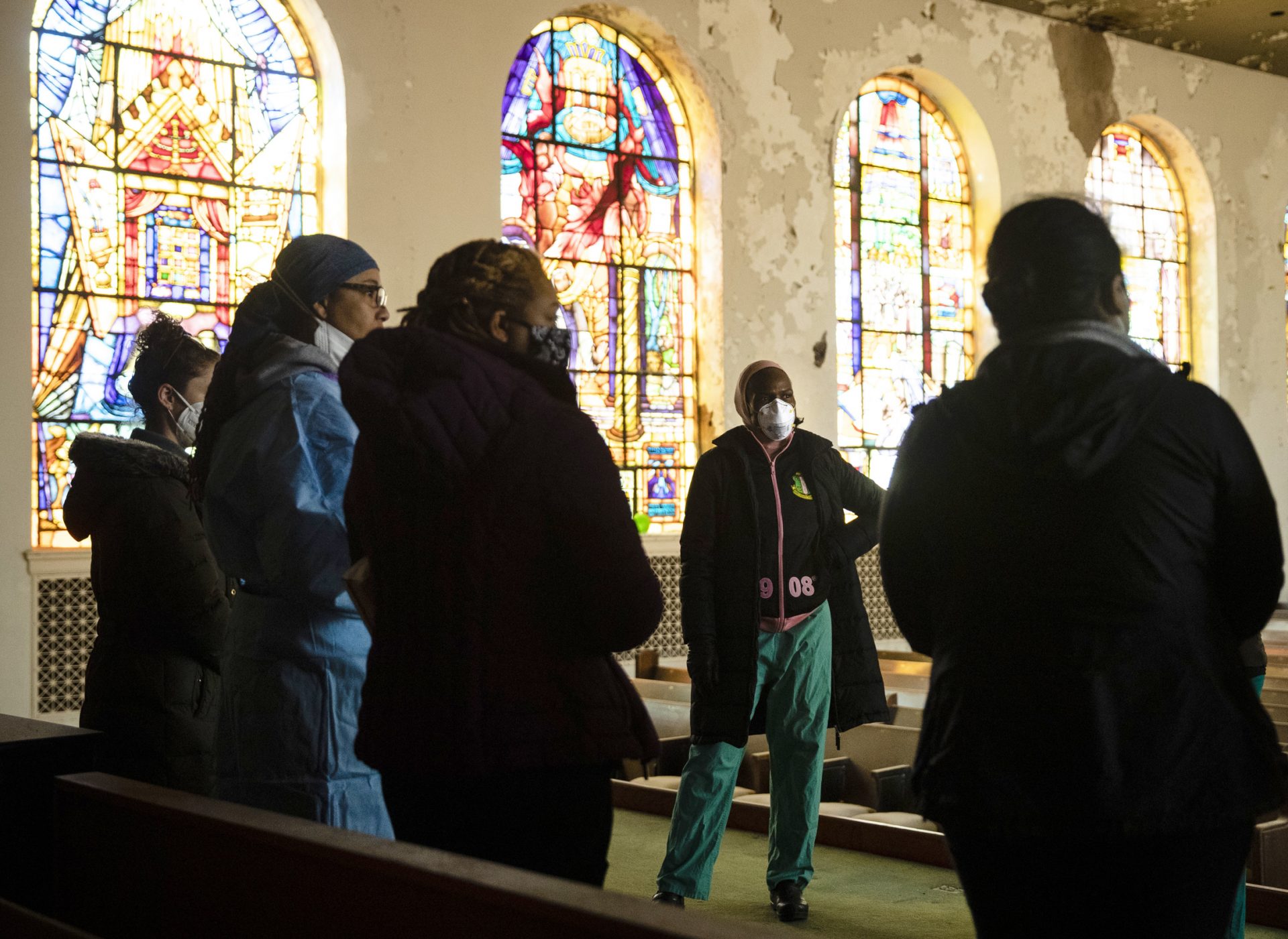 Dr. Ala Stanford speaks with volunteers ahead of the opening of a "barrier free" COVID-19 test location outside Pinn Memorial Baptist Church in Philadelphia in April.
