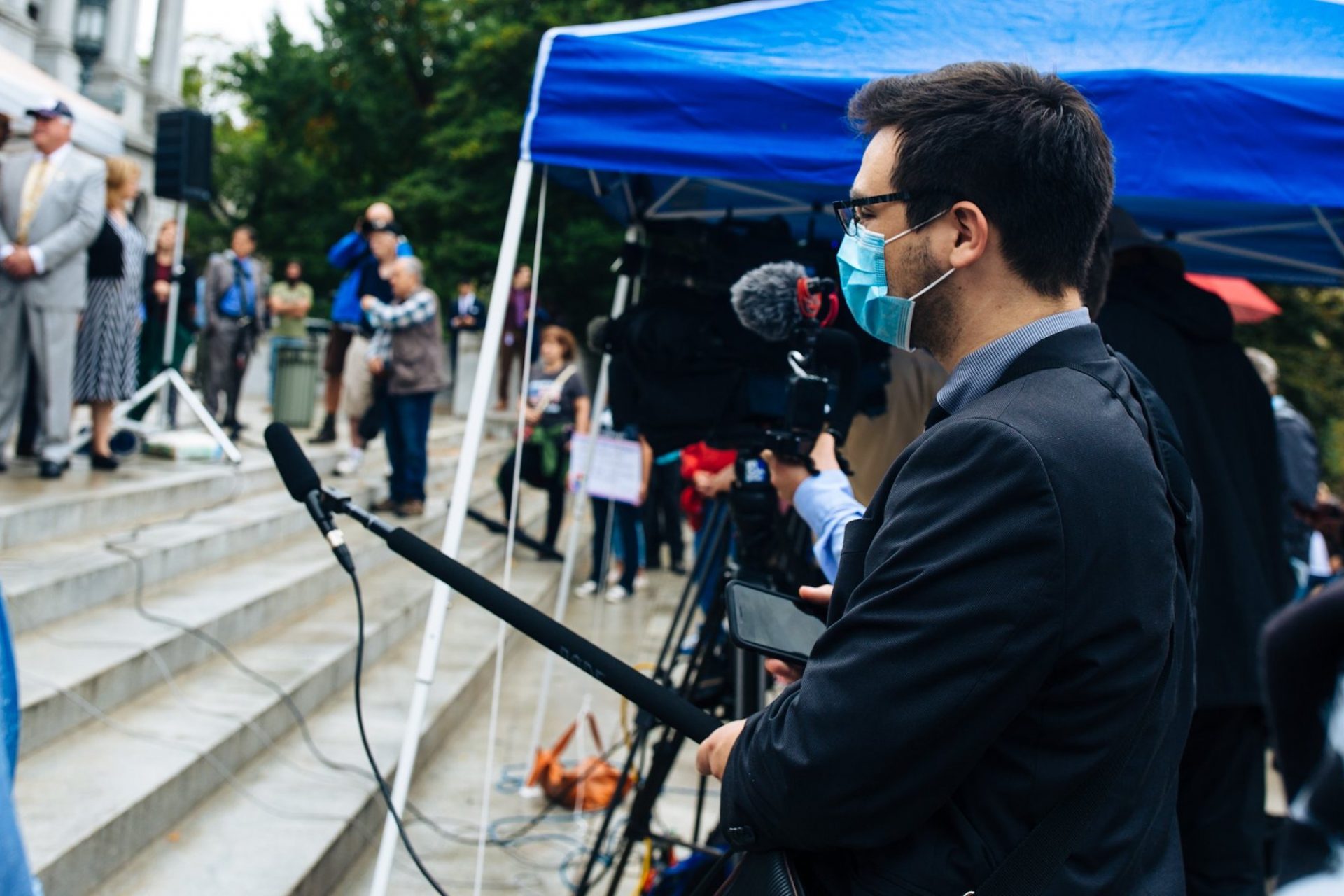 Reporter Sam Dunklau records audio at the Rally to Protect Your Right to Keep and Bear Arms at the state Capitol on Sept. 29, 2020.