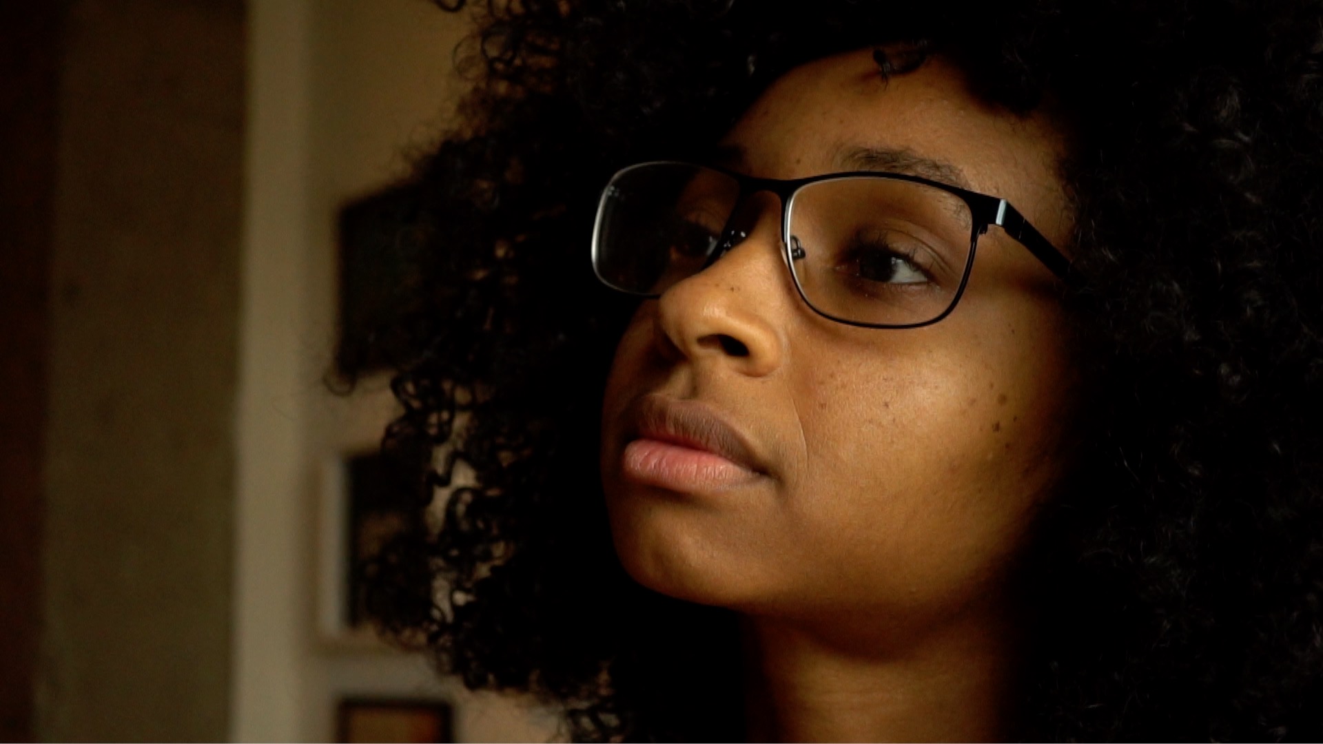 Young black woman with glasses
