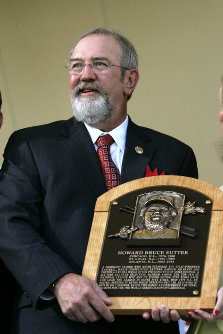 Bruce Sutter poses with his Baseball Hall of Fame plaque at induction ceremonies