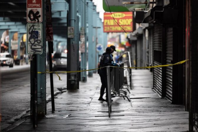 The Philadelphia police installed barricades along Kensington Avenue after removing people who were camped out there and cleaning the sidewalk. (Kimberly Paynter/WHYY)