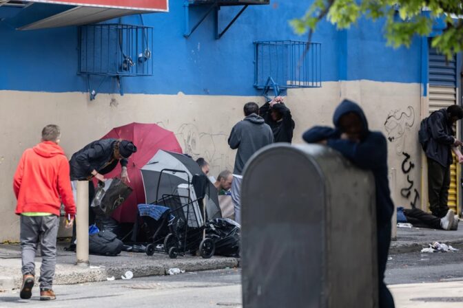 Open air drug use was still occurring in Kensington beyond the areas where Philadelphia officials had blocked off and swept on the morning of May 8, 2024. (Kimberly Paynter/WHYY)