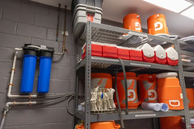 A PFAS filter is installed at the cooler filling station inside Central Bucks High School East’s athletic training room. (Kimberly Paynter/WHYY)
