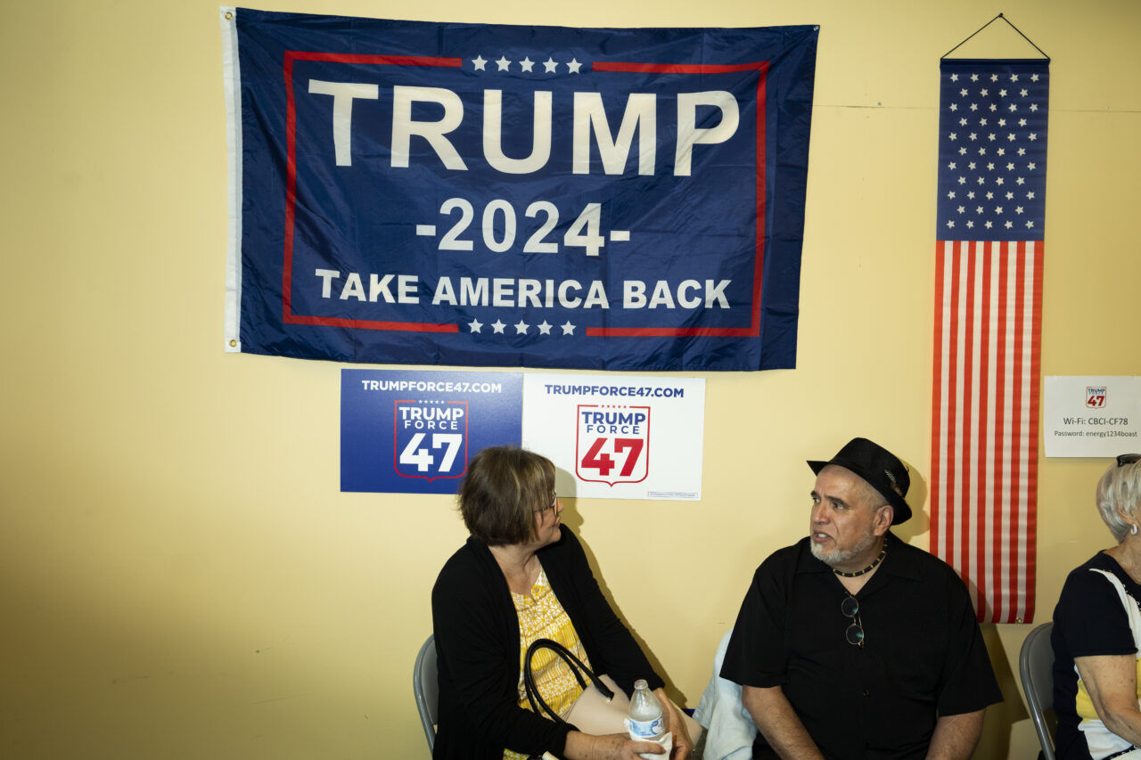 Attendees gather as the "Latino Americans for Trump" office opens in Reading, Pa., Wednesday, June 12, 2024. (AP Photo/Joe Lamberti)