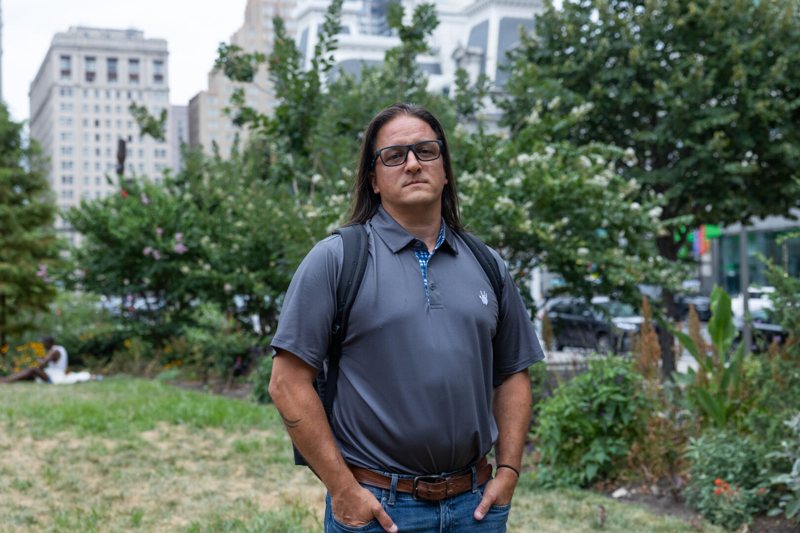 Andrew DiDonato, a construction plan review specialist for the department of licenses and inspections, poses for a photo in LOVE Park in Philadelphia, Pennsylvania on July 22, 2024.