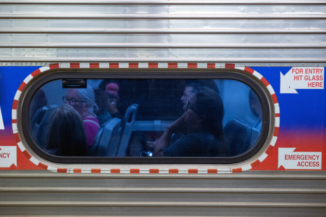 Andrew DiDonato (right) takes the train home from Suburban Station in Philadelphia, Pennsylvania on July 22, 2024.