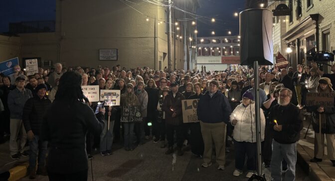 Rev. Elizabeth Peter Eckman of St. John's Lutheran in Shiremanstown speaks to a crowd opposing the distribution of fliers by a hate group in Mechanicsburg on Oct. 29, 2025.