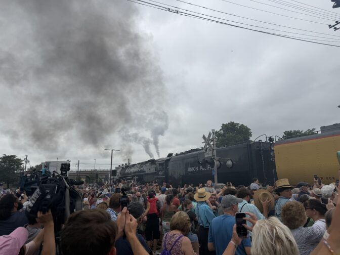 Thousands watch as the world's largest operating steam-powered train, Big Boy 4014, stops at a railway station in Lebanon, PA, on July 7, 2026.