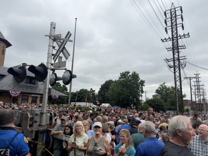 Thousands watch as the world's largest operating steam-powered train, Big Boy 4014, stops at a railway station in Lebanon, PA, on July 7, 2026.